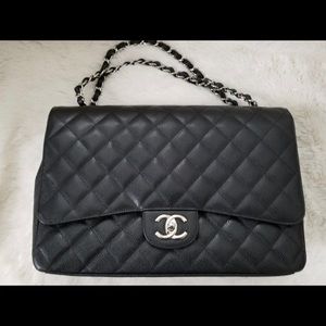 Sold Chanel Black Quilted Caviar Jumbo Classic
